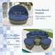 Round outdoor daybed with retractable canopy and navy cushions, perfect for backyard relaxation and entertaining guests.