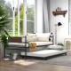 Twin size metal daybed with trundle and wood grain headboard, featuring a sturdy design and space-saving functionality.