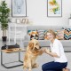 Elevated dog bowl stand with bamboo tabletop and stainless steel bowls, ideal for elder dogs in a cozy living room.