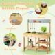 Kids mud kitchen playset made of solid pine wood with stove, shelves, and realistic cooking knobs for outdoor fun.