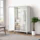 Rolling storage armoire closet in white with hanging rod, adjustable shelf, and wheels for easy movement in any bedroom.