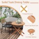 Round 31.5-inch folding coffee table made of high-grade teak wood with an X-shaped structure for outdoor use.
