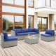 L-shaped 6 piece patio conversation sofa set in navy with tempered glass coffee table, ideal for outdoor relaxation.