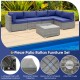 6-piece patio rattan furniture set with navy cushions, tempered glass coffee table, and sturdy metal frame for outdoor.