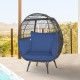 Oversized patio rattan egg lounge chair with navy cushions, featuring a sturdy frame and cozy design for outdoor.
