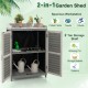Garden potting bench table with 2 storage shelves, gray metal tabletop, ideal for displaying potted plants and tools.