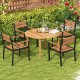Large round outdoor dining table made of acacia wood, seating 4, perfect for garden or patio dining.
