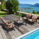 Patio set featuring 5 pieces with rocking chairs and a versatile fire pit table, perfect for backyard relaxation.