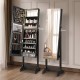 Freestanding jewelry cabinet in black with full-length mirror, ample storage, and adjustable LED lights for convenience.