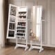 Freestanding jewelry cabinet in white with an open view, highlighting organized storage partitions and built-in mirrors.