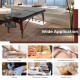 Folding massage table in black with height-adjustable beech wood frame, ideal for spa, acupuncture, and therapy.