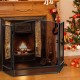Foldable 3-panel fireplace screen in black wrought iron, providing safety from sparks and embers for living room use.