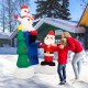 6-foot inflatable Christmas decoration featuring Santa Claus, snowman, and tree, illuminated for festive outdoor.