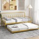 Twin size golden metal daybed with trundle and lockable wheels, ideal for guest rooms and maximizing space.