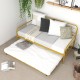 Golden metal twin size daybed with trundle, featuring lockable wheels and cushions, ideal for guest accommodations.