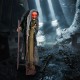 Life-size animatronic witch with red eyes and posable arms, perfect for Halloween decorations and haunted houses.