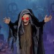 Life-size animatronic witch showcasing posable arms and glowing red eyes, ideal for creating a spooky ambiance at.