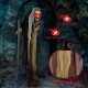 Life-size animatronic witch with red eyes, posable arms, and selected fabric for easy maintenance, perfect for.