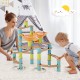 Bamboo marble run set with colorful cylinders and funnels, promoting creativity and hands-on fun for kids.