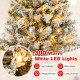 Close-up of a 6 ft artificial Xmas tree with 300 warm white LED lights, featuring snow-like flocking for a festive look.