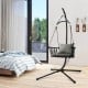 Hanging swing chair with stand in gray, featuring soft cushions and a reinforced metal stand for indoor or outdoor use.