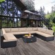 L-shaped 10 piece outdoor wicker conversation set with beige cushions, perfect for spacious patio gatherings.