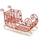 Red metal Christmas Santa sleigh with golden star accents, spacious cargo area for gifts, perfect holiday decor.