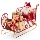 Metal Christmas Santa sleigh with spacious cargo area, featuring golden star accents and a festive Santa for holiday.