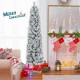 Flocked 6-foot Christmas tree with 258 branch tips and 100 warm white lights, beautifully decorated in a cozy living.
