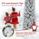 6-foot flocked Christmas tree with 373 branch tips, warm white lights, and fireproof PVC for festive holiday decor.