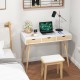 Computer desk with three drawers and solid rubber wood legs, ideal for home office or workspace organization.