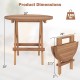 Round folding coffee table made of teak wood, featuring slatted tabletop and compact design for easy storage and.