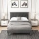Full size platform bed with high velvet headboard, wooden slats, and stylish design for comfortable sleeping.