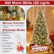 Hinged 7.5 ft Christmas tree with 560 warm white LED lights and snowy PVC branch tips, perfect for festive decor.