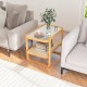 2-tier bamboo side table with glass top, featuring a rattan shelf for storage, perfect for living room or bedroom use.
