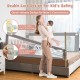 Vertical lifting baby bed rail with cute pattern, adjustable height, and double safety lock for child protection.