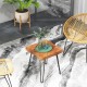 Square reclaimed teak wood end table with rustic edges and metal legs, perfect for storage and display in any living.