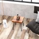 Square reclaimed teak wood end table with unique grains, metal legs, and polished surface for rustic charm in any space.