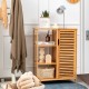 Bamboo bathroom storage cabinet with single louvered door and three shelves, ideal for compact spaces and organization.