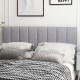 Gray linen upholstered headboard with vertical channel tufting, sponge padding, and solid wood legs for full or queen.