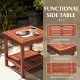 Double-tier acacia wood patio side table with slatted tabletop, round corners, and shelf for backyard or poolside use.