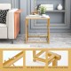 Square end table with tempered glass top and gold geometric frame, featuring non-slip foot pads for stability.
