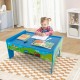 Colorful children's activity table with removable top, perfect for drawing and playing with the 80-piece train set.