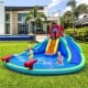 Inflatable waterslide bounce house with two slides, splash pool, and climbing wall for outdoor fun.
