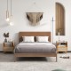 Bamboo rattan nightstand with drawer and solid wood legs, featuring cable management slots and a stylish glass tabletop.