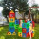 Colorful 32-piece waffle block set for kids, ideal for building forts and stimulating creativity in outdoor play.