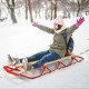 Kids wooden snow sled with metal runners, featuring a steering bar, perfect for smooth sliding in the snow.