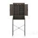Over the toilet storage cabinet in gray with double doors, adjustable shelves, and a stable trapezoid metal frame.