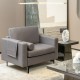 Modern gray single sofa with cushion bolster and side storage pocket, ideal for living room or office relaxation.