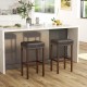 Saddle-shaped gray upholstered bar stools set of 2 with rubber wood legs and footrests for kitchen islands or dining.